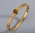 Cuff Bracelet with Brown Oval Crystal, Gold-Plated Steel